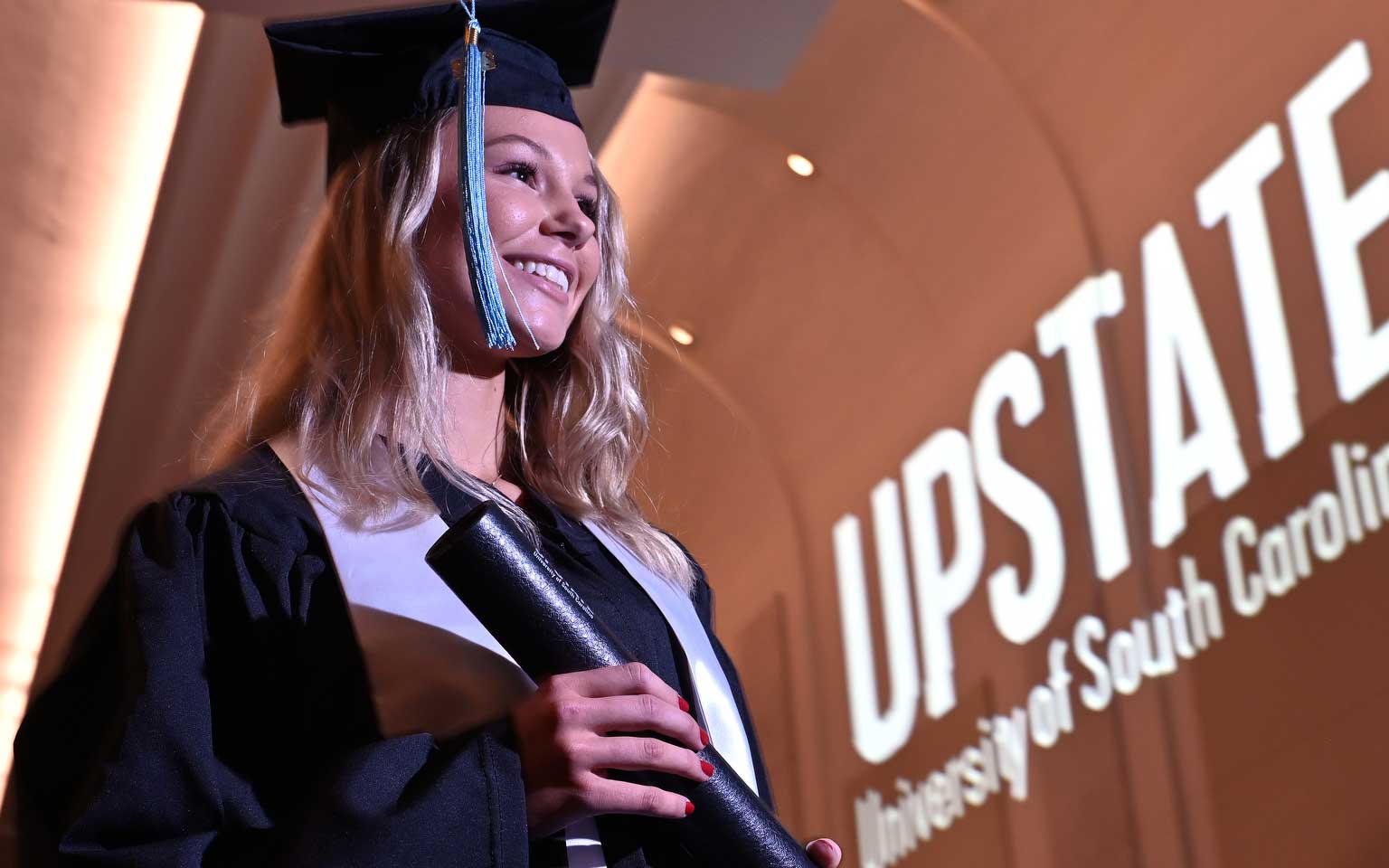 Image of a graduate during winter commencement
