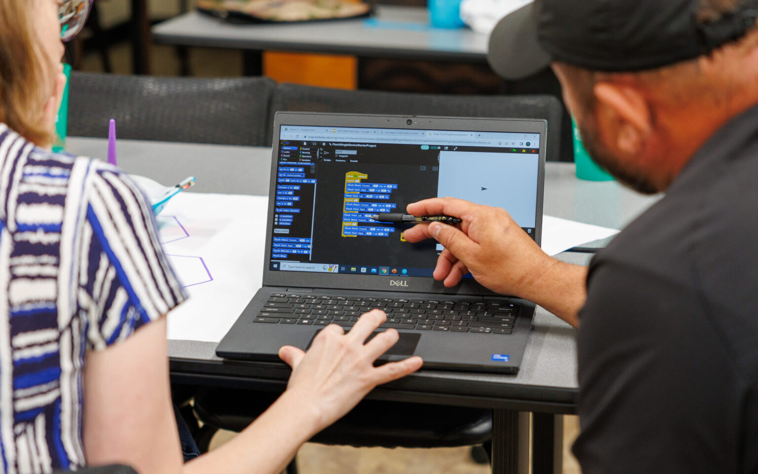 Students at a computer.